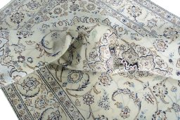 Surface texture of New Nain rug with natural Wool and intricate pattern