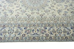 Corner detail of New Nain rug showing border pattern and Wool pile