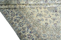 Close-up detail of New Nain rug from Iran / Persia showing Wool weave