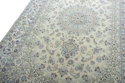 Backside of handmade New Nain rug showing knot structure and weave density