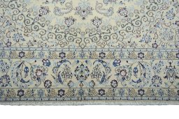 Full view of New Nain rug from Iran / Persia, 298 × 200 cm in Beige tones