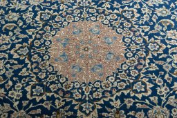 Central medallion detail of 1970s Nain rug from Iran / Persia