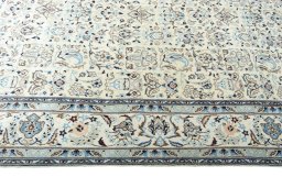 Corner detail of New Nain rug showing border pattern and Wool pile