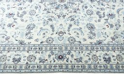 Corner detail of New Nain rug showing border pattern and Wool pile