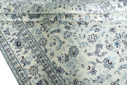 Close-up detail of New Nain rug from Iran / Persia showing Wool weave