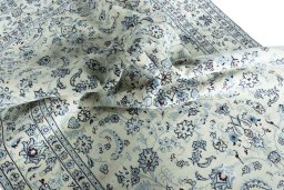 Surface texture of New Nain rug with natural Wool and intricate pattern
