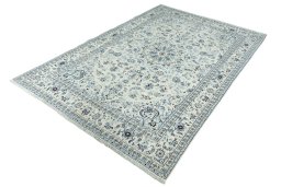 Corner detail of New Nain rug showing border pattern and Wool pile