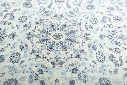 Central medallion detail of New Nain rug from Iran / Persia