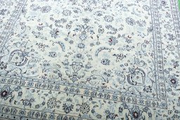 Close-up detail of New Nain rug from Iran / Persia showing Wool weave