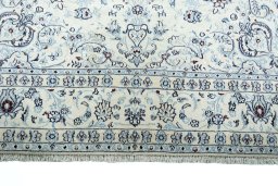 Full view of New Nain rug from Iran / Persia, 293 × 197 cm in Beige tones
