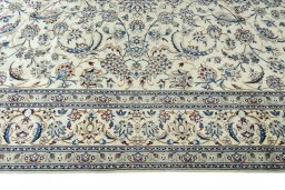Corner detail of New Nain rug showing border pattern and Wool pile