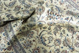 Surface texture of New Nain rug with natural Wool and intricate pattern