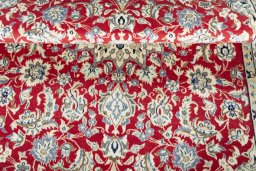 Corner detail of New Nain rug showing border pattern and Wool pile
