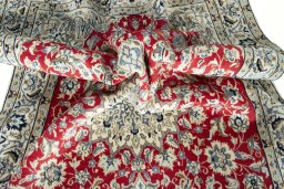 Close-up detail of New Nain rug from Iran / Persia showing Wool weave
