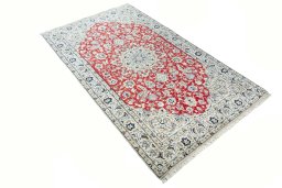 Corner detail of New Nain rug showing border pattern and Wool pile