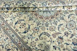 Close-up detail of New Nain rug from Iran / Persia showing Wool weave