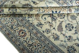 Corner detail of New Nain rug showing border pattern and Wool pile