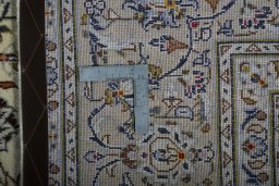 Surface texture of New Nain rug with natural Wool and intricate pattern