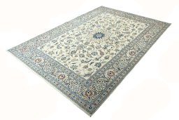Corner detail of New Nain rug showing border pattern and Wool pile