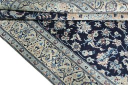 Close-up detail of New Nain rug from Iran / Persia showing Wool weave