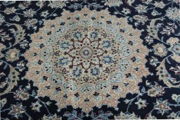 Central medallion detail of New Nain rug from Iran / Persia