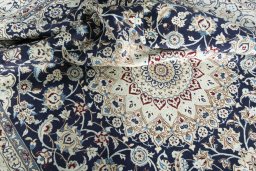 Surface texture of New Nain rug with natural Wool and intricate pattern