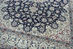 Close-up detail of New Nain rug from Iran / Persia showing Wool weave