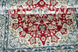 Close-up detail of 2000s Nain rug from Iran / Persia showing Wool weave