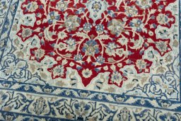 Close-up detail of 2000s Nain rug from Iran / Persia showing Wool weave