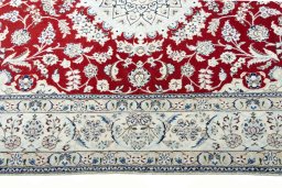 Corner detail of New Nain rug showing border pattern and Cork pile