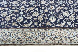 Corner detail of New Nain rug showing border pattern and Wool pile