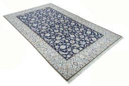Close-up detail of New Nain rug from Iran / Persia showing Wool weave