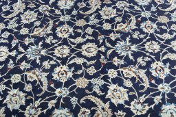 Central medallion detail of New Nain rug from Iran / Persia