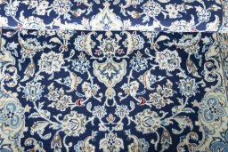 Close-up detail of 2000s Nain rug from Iran / Persia showing Wool weave