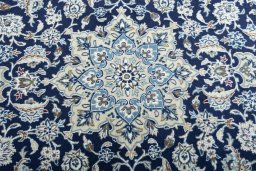 Central medallion detail of 2000s Nain rug from Iran / Persia