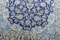 Close-up detail of 2000s Nain rug from Iran / Persia showing Wool weave