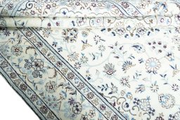 Close-up detail of New Nain rug from Iran / Persia showing Wool weave