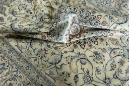 Surface texture of New Nain rug with natural Wool and intricate pattern