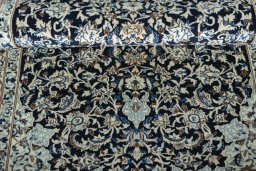 Close-up detail of 2000s Nain rug from Iran / Persia showing Wool weave