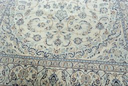 Corner detail of New Nain rug showing border pattern and Wool pile