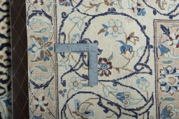 Close-up detail of New Nain rug from Iran / Persia showing Wool weave