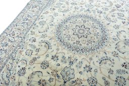 Backside of handmade New Nain rug showing knot structure and weave density