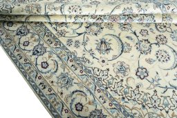 Close-up detail of New Nain rug from Iran / Persia showing Wool weave