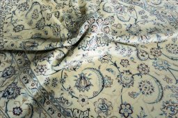 Surface texture of New Nain rug with natural Wool and intricate pattern