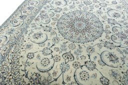 Backside of handmade New Nain rug showing knot structure and weave density