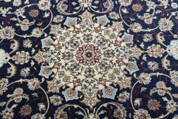Central medallion detail of New Nain rug from Iran / Persia