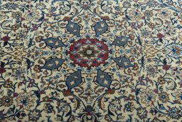 Central medallion detail of 2000s Nain rug from Iran / Persia