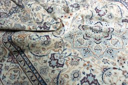 Surface texture of New Nain rug with natural Wool and intricate pattern