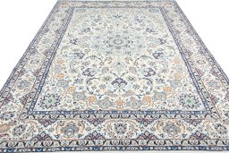 Surface texture of New Nain rug with natural Wool and intricate pattern