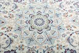 Central medallion detail of New Nain rug from Iran / Persia